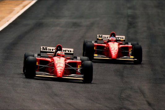 gerhard berger and jean alesi in the 1990s in ferrari formula 1 cars